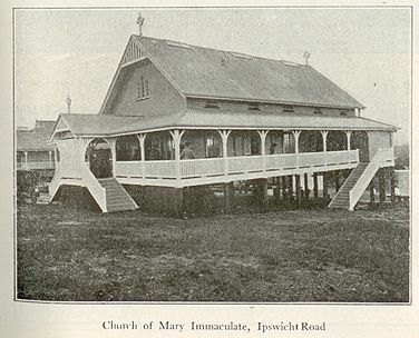 Historic Church of Mary Immaculate building on raised structure with external stairs and veranda walkway